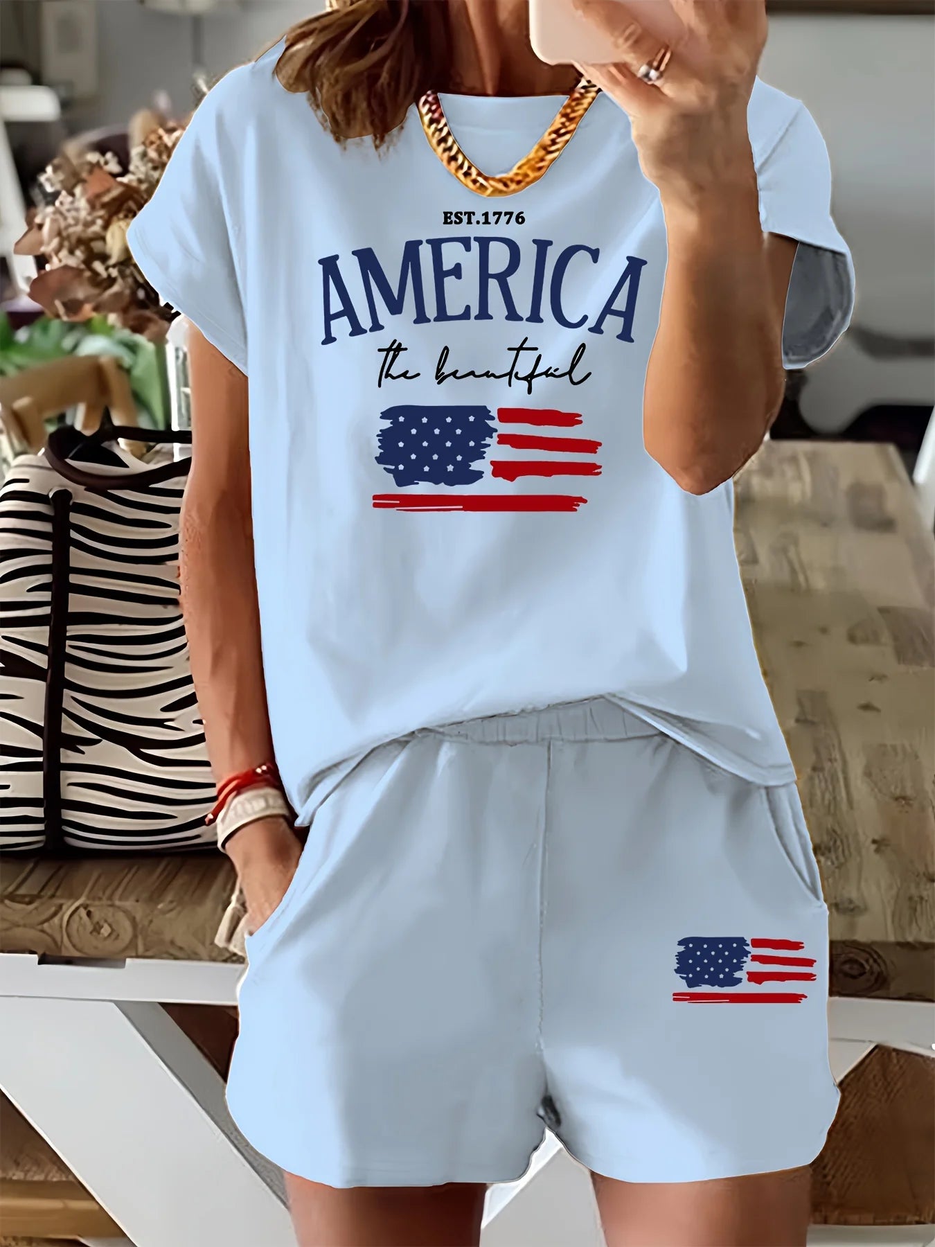 Summer women's Comfortable and loose white cartoon print casual loose round neck short sleeved T-shirt shorts two-piece set